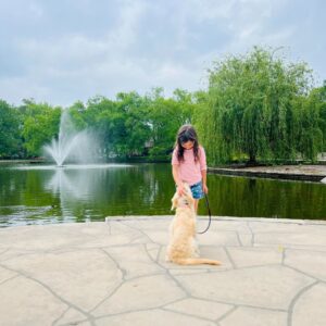 A child with her dog